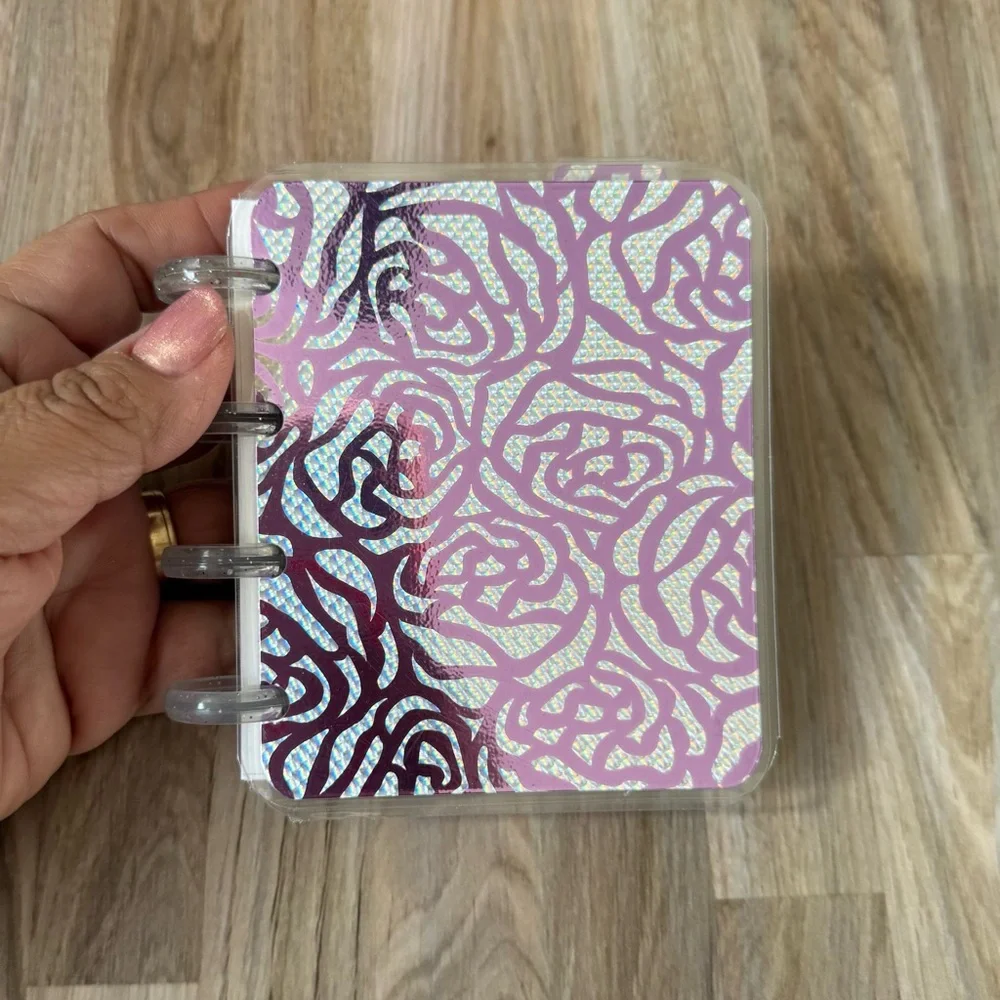 Micro planner holographic roses pink and silver weekly layout.